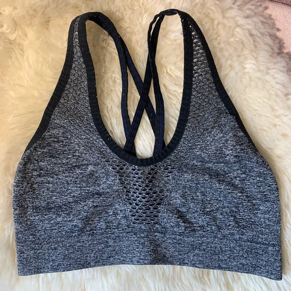Sports bra grey with mesh design.
